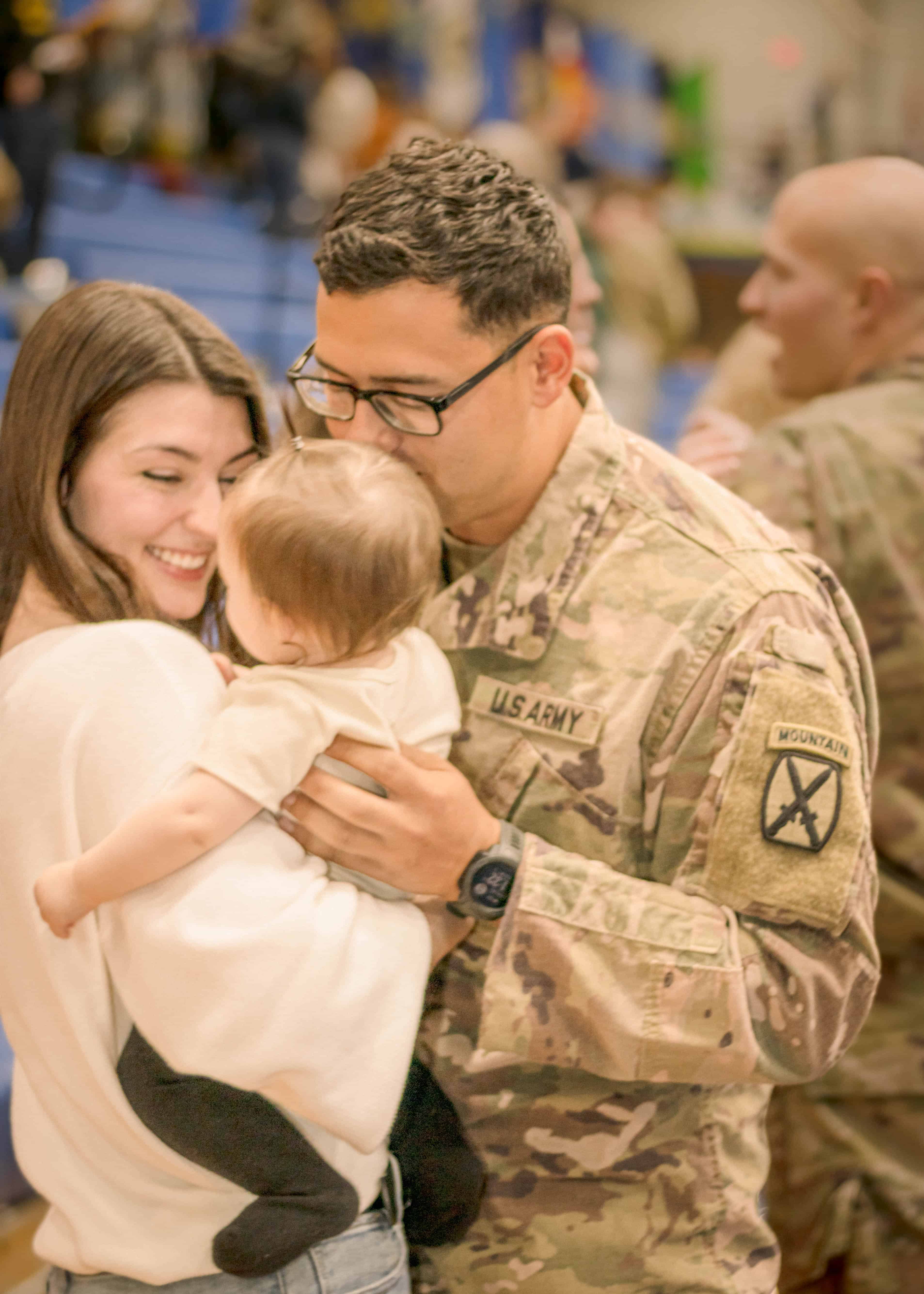 Portrait photography, Military homecoming- soldier meets his 7 month old baby girl for the first time copyright Takyi Taylor Marketing, LLC, LT² Photography and LaDonna Takyi Taylor
